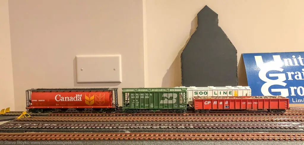 Three model train cars